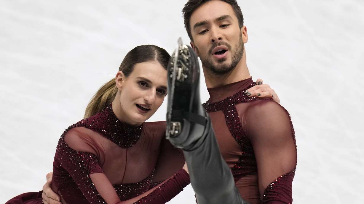 FILE - Gabriella Papadakis and Guillaume Cizeron of France perform in the rhythm dance program at the Figure Skating World Championships in Montpellier, south of France, March 25, 2022.