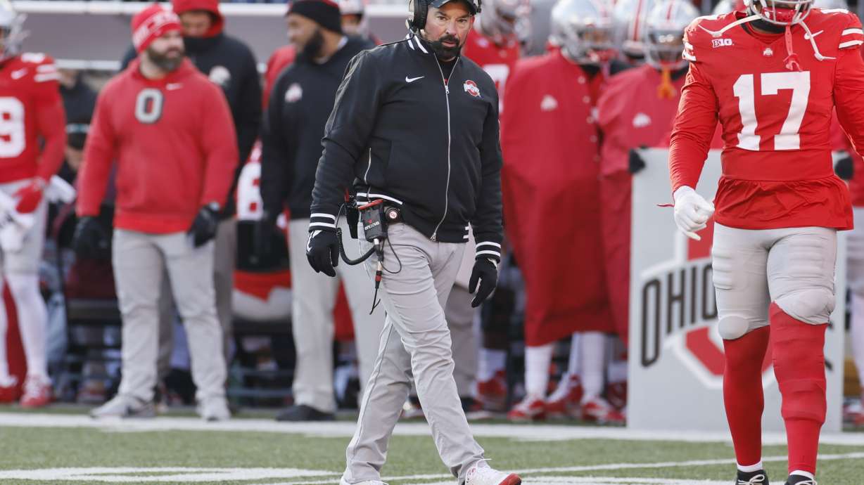 Ohio State head coach Ryan Day, center, looks on during the second half of an NCAA college football game against Michigan, Saturday, Nov. 30, 2024, in Columbus, Ohio.