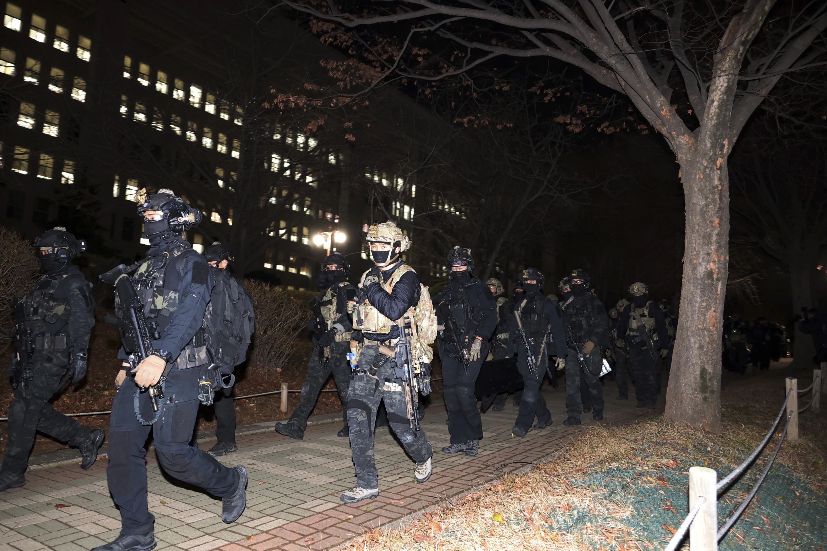 South Korean martial law soldiers leave the National Assembly in Seoul, South Korea, Wednesday.