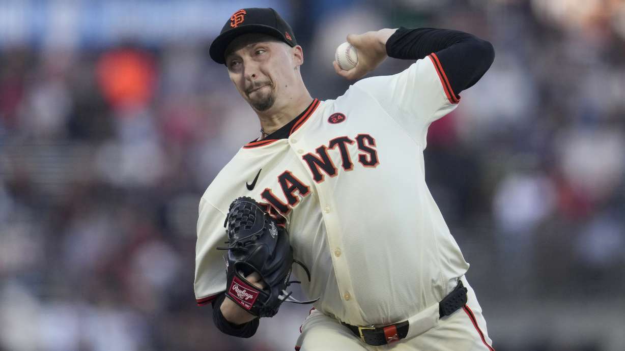 FILE - San Francisco Giants pitcher Blake Snell works against the Atlanta Braves during the first inning of a baseball game in San Francisco, Aug. 12, 2024.