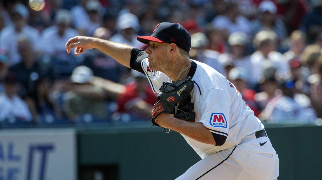 FILE - Cleveland Guardians relief pitcher Connor Gillispie delivers in the eighth inning of a baseball game against the Baltimore Orioles in Cleveland, Sunday, Aug. 4, 2024.