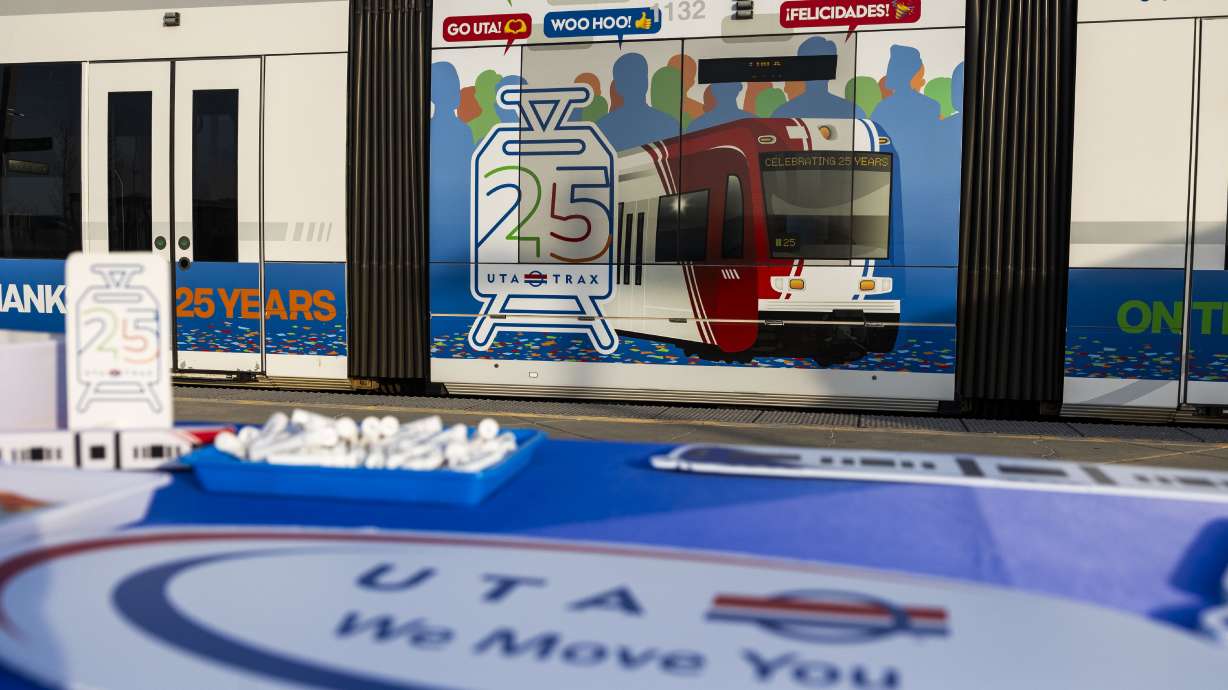 A TRAX car is decorated for a celebration of the 25th anniversary of TRAX, at Salt Lake Central Station in Salt Lake City on Monday. The light rail service debuted to the public 25 years ago Wednesday.