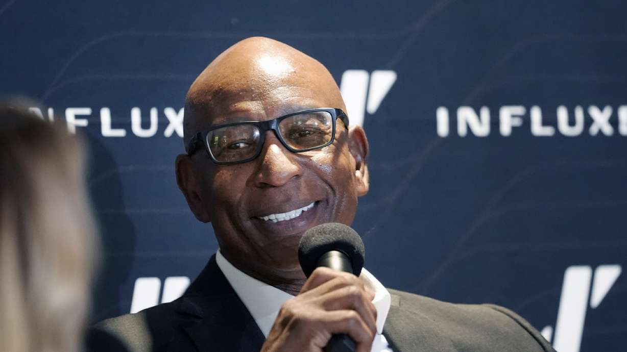 Former NFL and SMU running back Eric Dickerson speaks during a panel discussion about NIL and NCAA college football, Tuesday, Dec. 3, 2024, in Dallas.