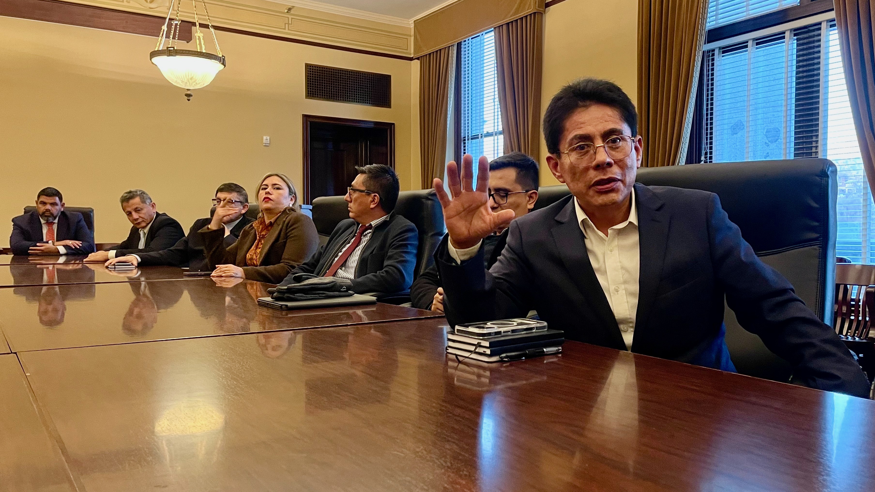 Miguel Quispe, right, a Peruvian businessman, during a visit to the state Capitol in Salt Lake City with other Peruvian government and business officials on Tuesday. They are on a trade mission to Utah.