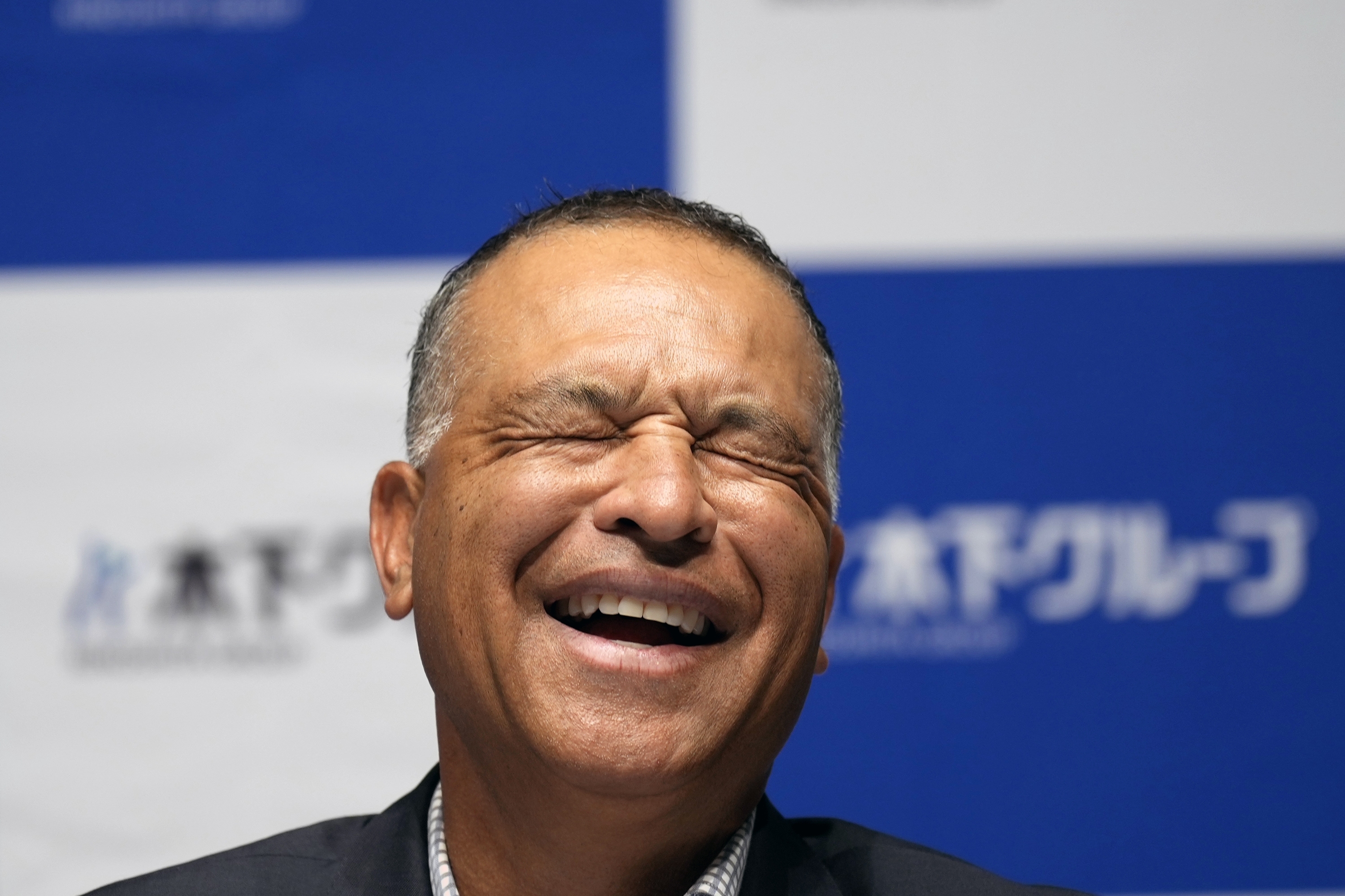 Los Angeles Dodgers manager Dave Roberts attends a press conference on the commercials he appears Wednesday, Dec. 4, 2024, in Tokyo.