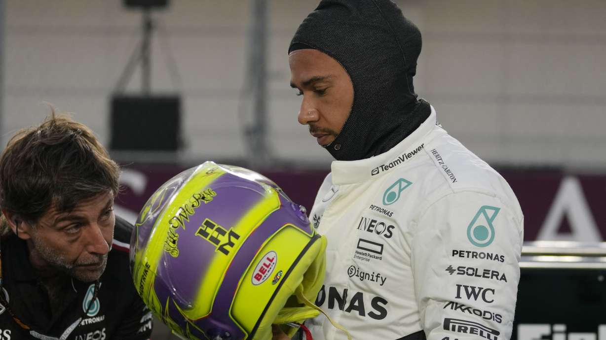 Mercedes driver Lewis Hamilton of Britain prepares prior to the start of the sprint race at the Formula One Qatar Grand Prix, at the Lusail International Circuit in Lusail, Qatar, Saturday, Nov. 30, 2024.