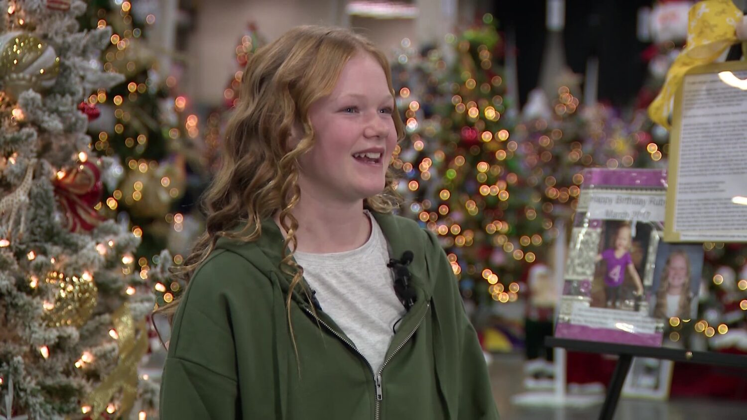 Ruby Thackeray, seen Tuesday at the Festival of Trees in Sandy, speaks about her experiences with growing up with melanoma.