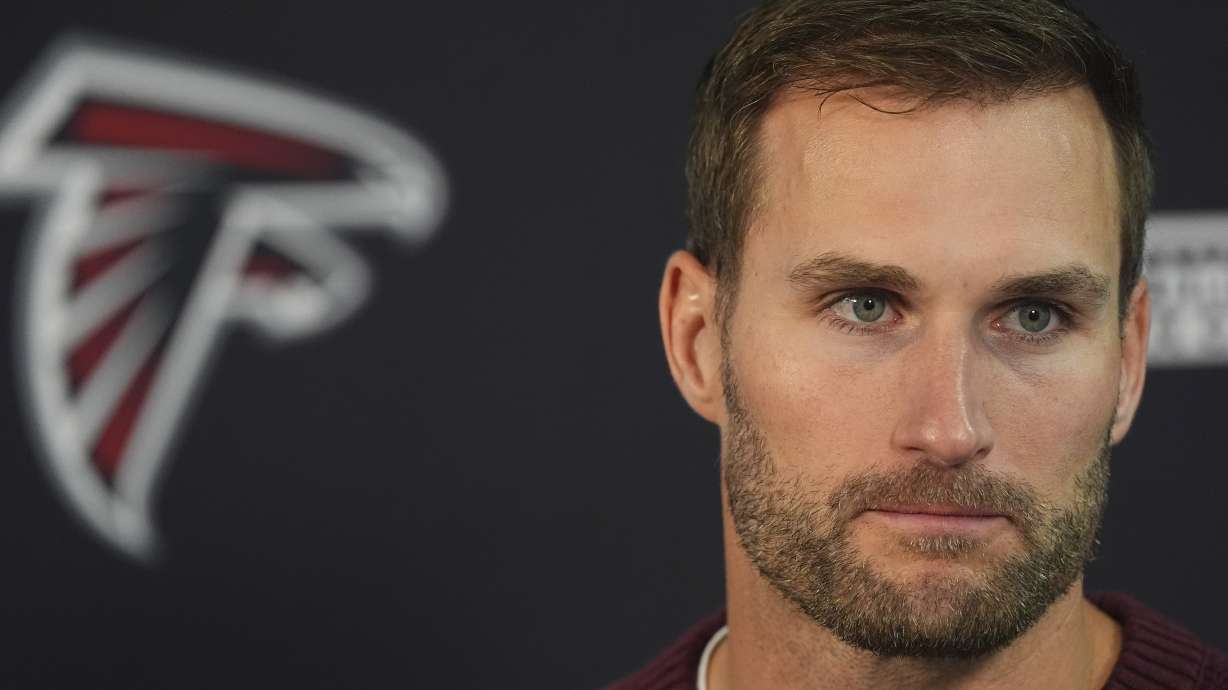 Atlanta Falcons quarterback Kirk Cousins considers a question during a news conference after an NFL football game against the Denver Broncos, Sunday, Nov. 17, 2024, in Denver.