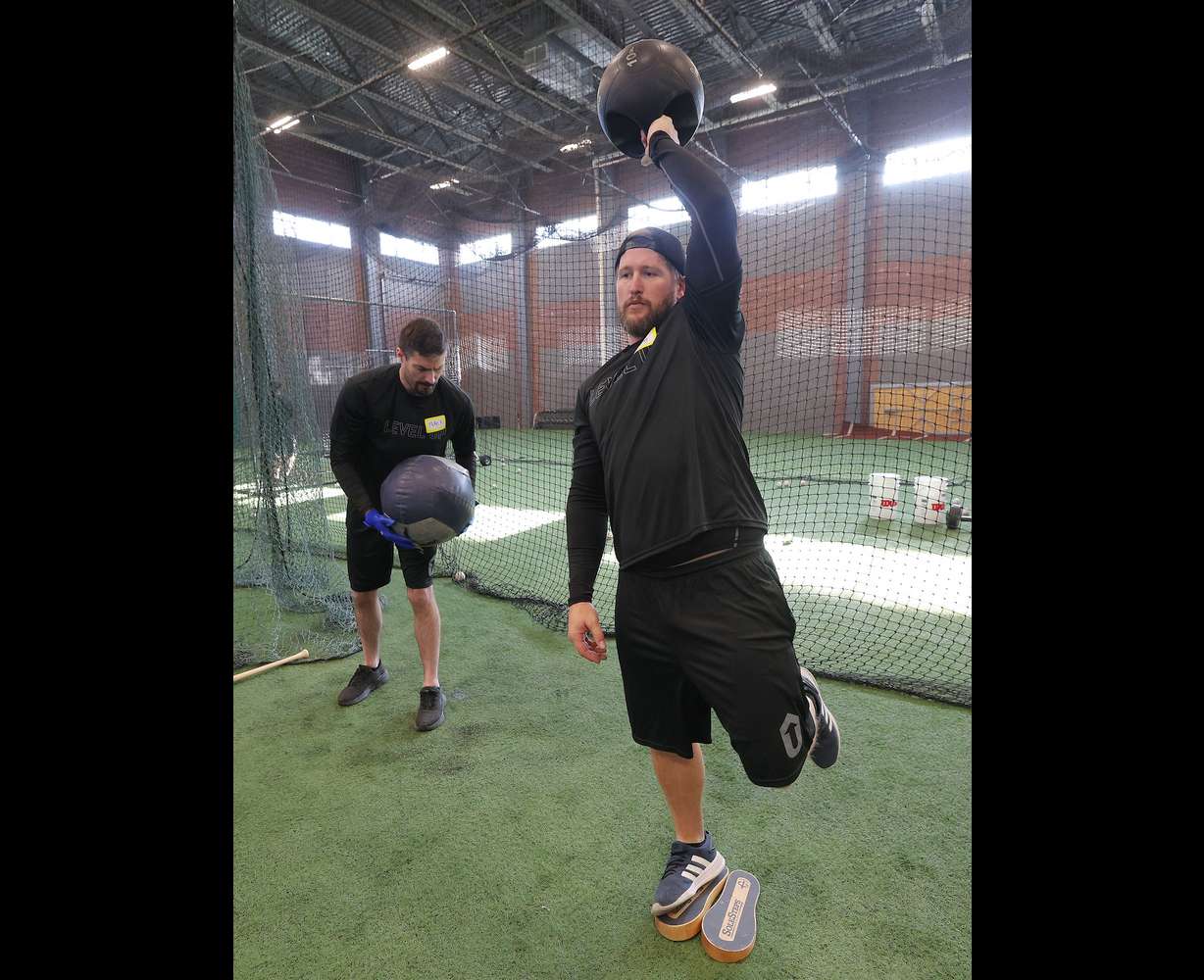 Mckay Nehring and Mike Elledge work out as Unified Police Department SWAT teams participate in Empowering Training hosted by Level Up Performance in Sandy on Wednesday.
