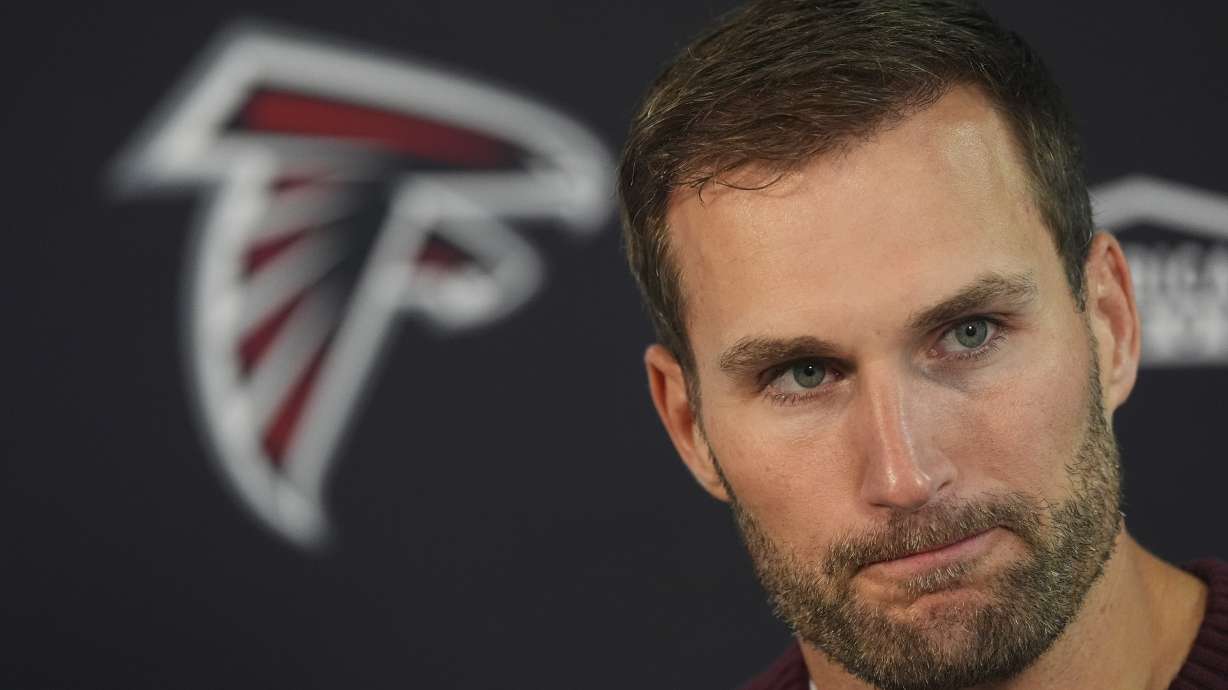 Atlanta Falcons quarterback Kirk Cousins considers a question during a news conference after an NFL football game Sunday, Nov. 17, 2024, in Denver.