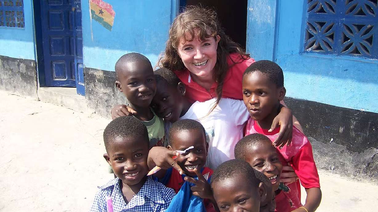 Laura Belk, center, spends time with students while doing work in West Africa for her and her husband's nonprofit, Nurturing Nations. This December, Utahns are encouraged to participate in their latest fundraiser, a "virtual walk" from Payson to Ghana.