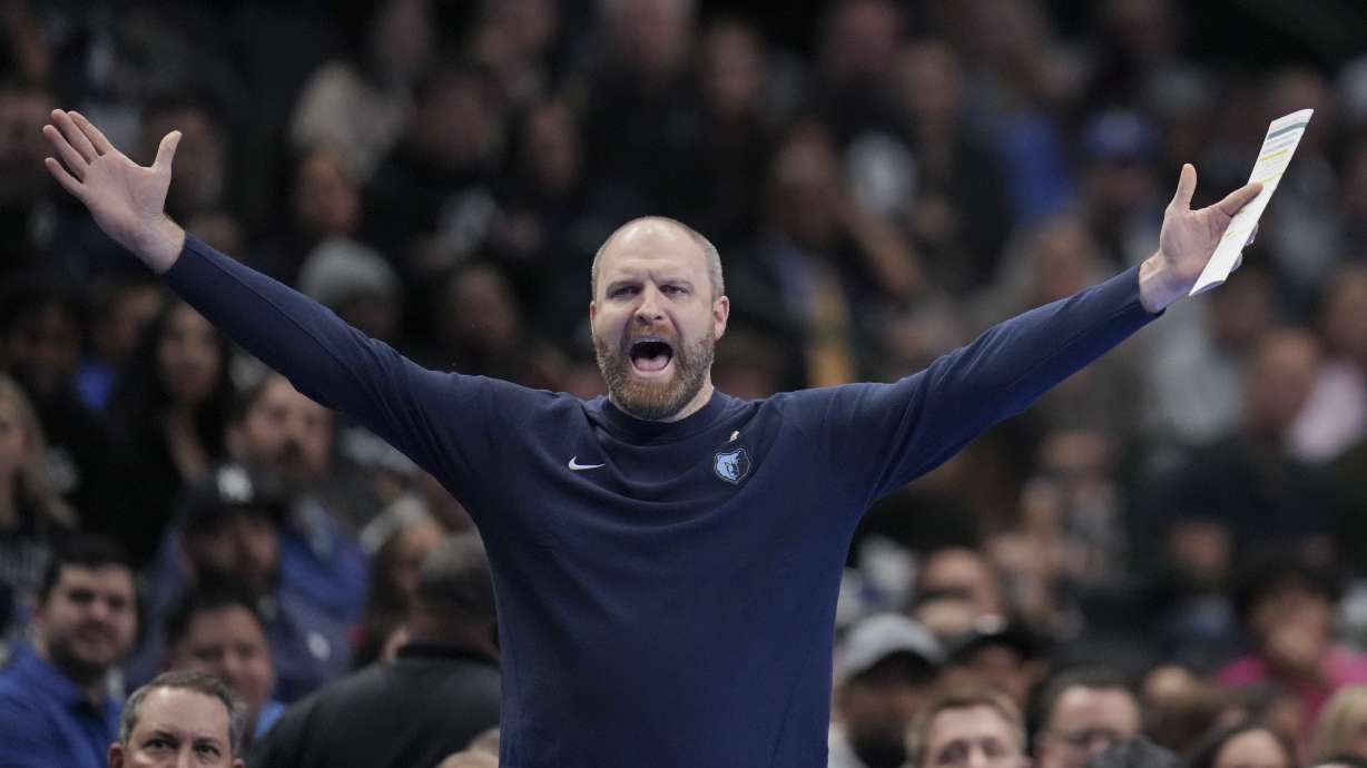 Memphis Grizzlies head coach Taylor Jenkins reacts during the first half of an Emirates NBA Cup basketball game against the Dallas Mavericks, Tuesday, Dec. 3, 2024, in Dallas.