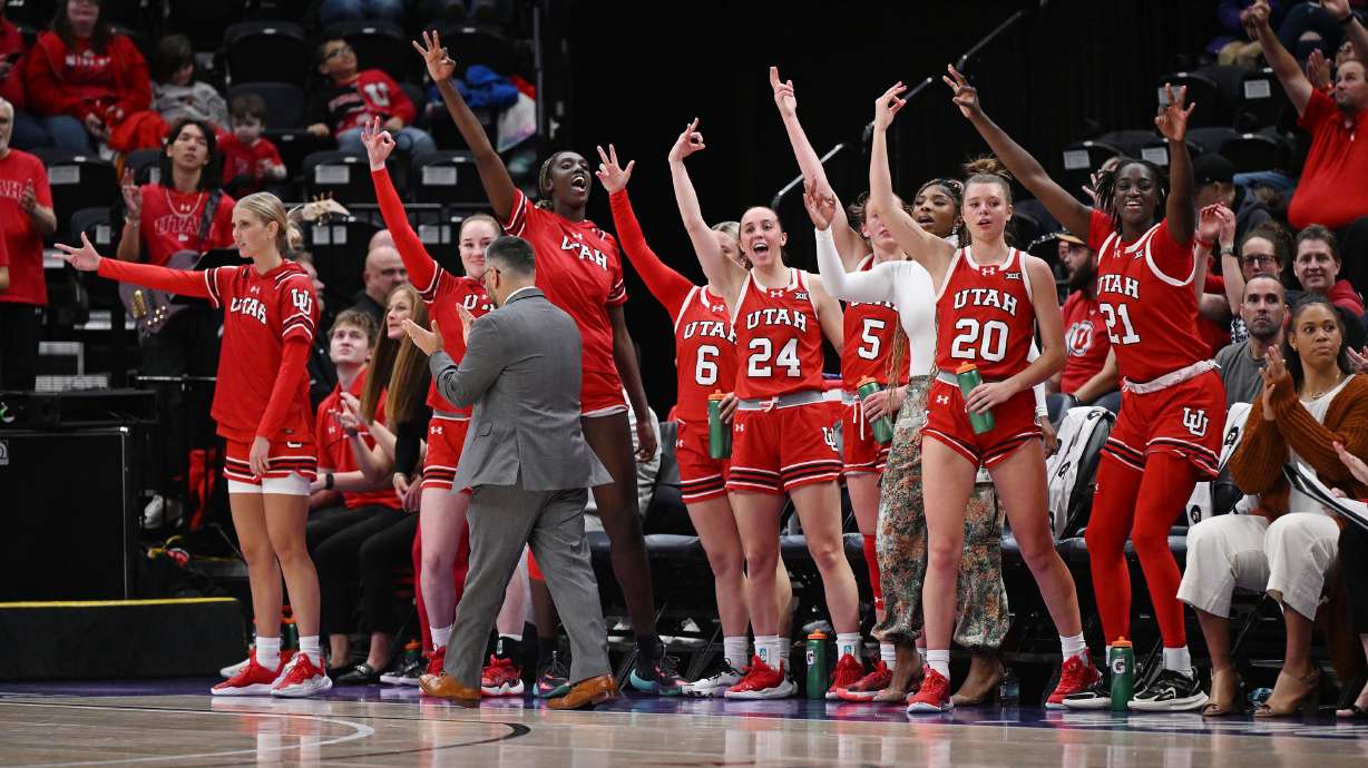 Utah Utes players celebrate after a 3-point shot as Utah and Utah State women play at the Delta Center in Salt Lake City on Wednesday, Dec. 4, 2024.