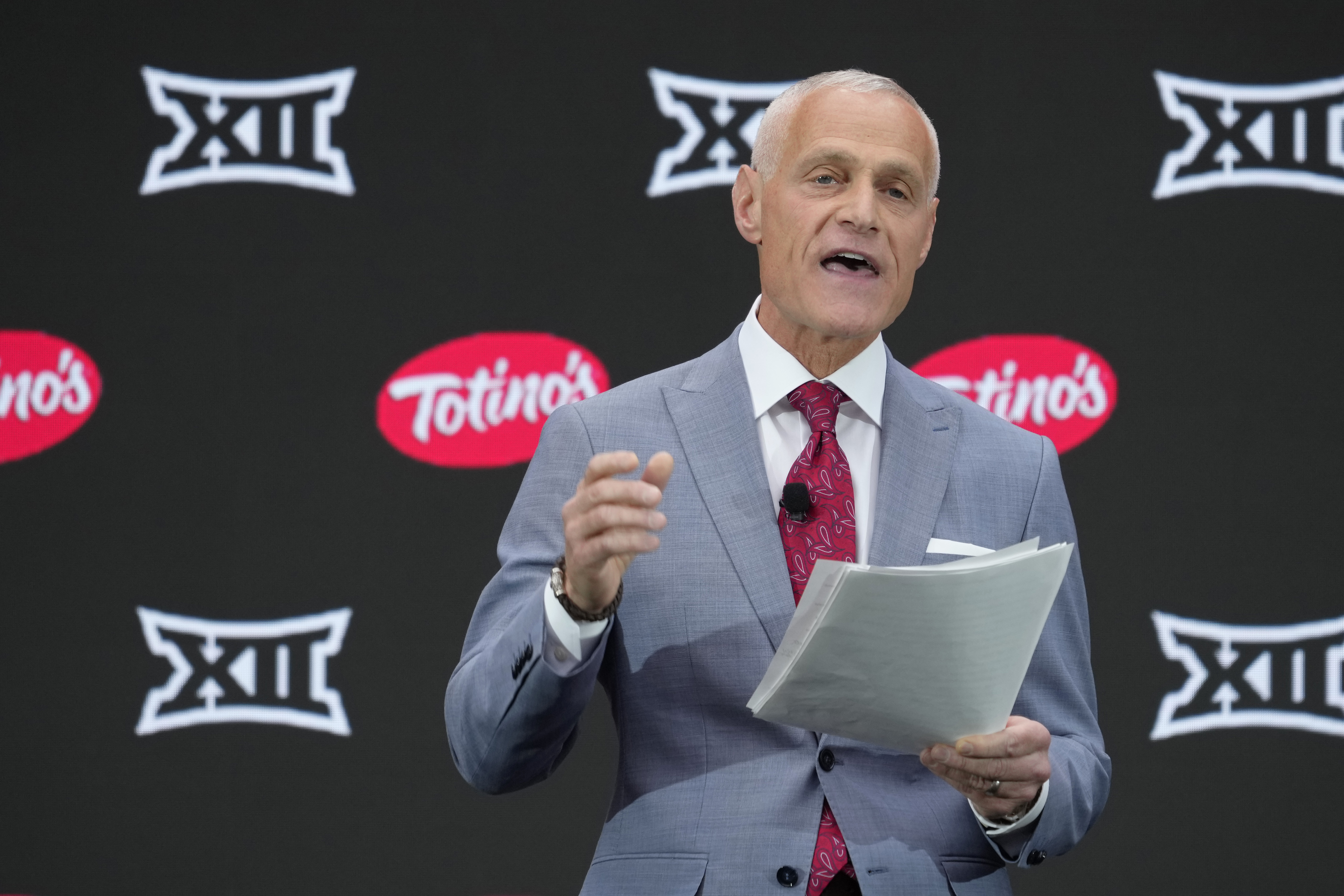 FILE - Big 12 Commissioner Brett Yormark speaks during Big 12 NCAA college football media days in Las Vegas, July 9, 2024.