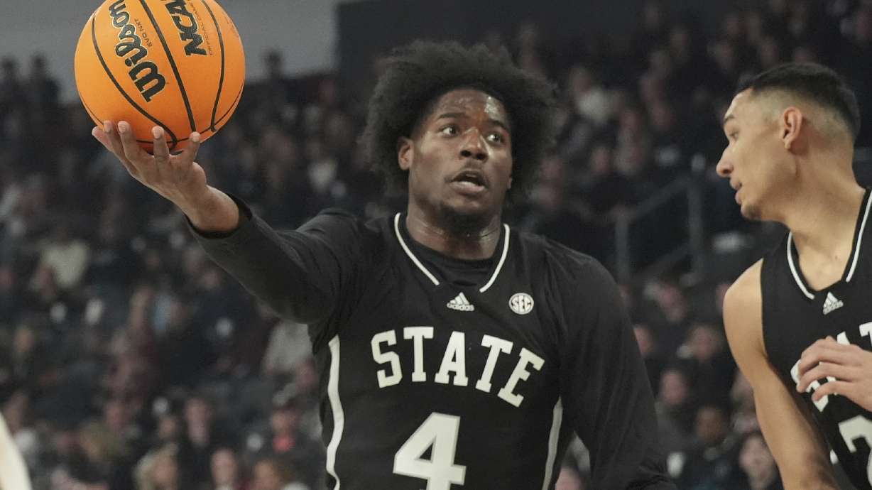 Mississippi State forward Cameron Matthews (4) pulls down an offensive rebound during the first half of an NCAA college basketball game against Pittsburgh, Wednesday, Dec. 4, 2024, in Starkville, Miss.