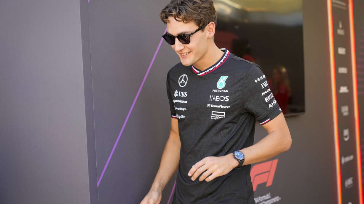Mercedes driver George Russell of Britain is in paddock ahead of the Formula One Abu Dhabi Grand Prix, at the Yas Marina Circuit in Abu Dhabi, UAE, Thursday, Dec. 5, 2024.