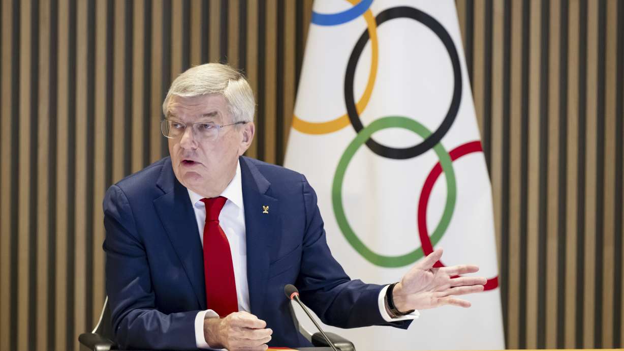 International Olympic Committee (IOC) President Thomas Bach speaks at the opening of the executive board meeting of the IOC, at the Olympic House, in Lausanne, Switzerland, Tuesday, Dec. 3, 2024.