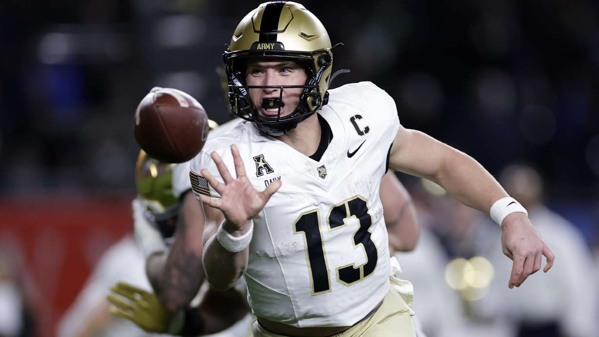 Army quarterback Bryson Daily throws the ball during the first half of an NCAA college football game against Notre Dame at Yankee Stadium on Saturday, Nov. 23, 2024, in New York.