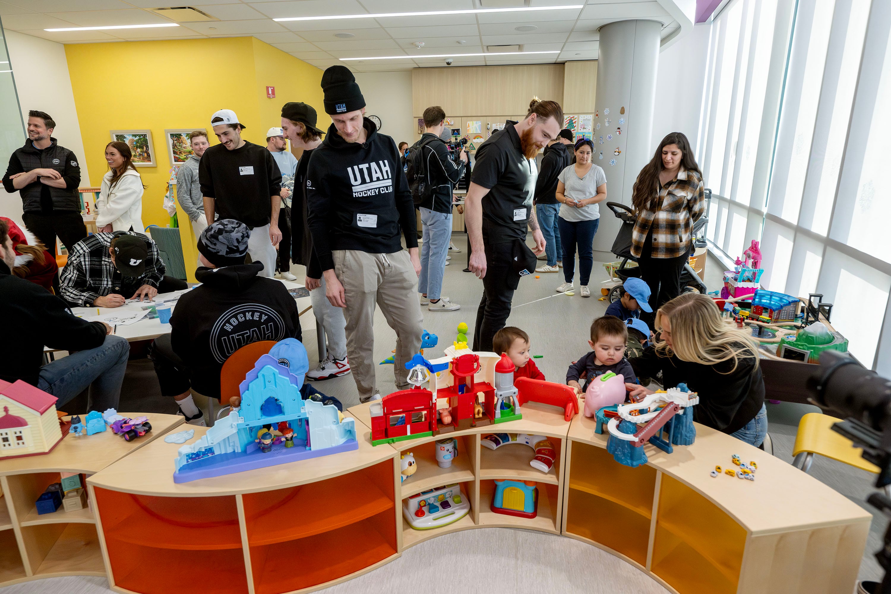 Members of the Utah Hockey Club visit kids at Primary Children’s Hospital in Lehi on Wednesday.