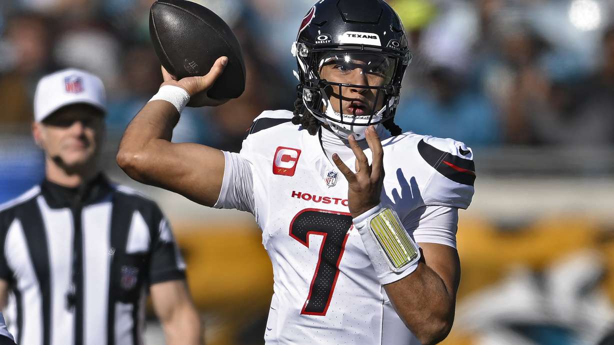 Houston Texans quarterback C.J. Stroud (7) throws a pass against the Jacksonville Jaguars during the first half of an NFL football game Sunday, Dec. 1, 2024, in Jacksonville, Fla.