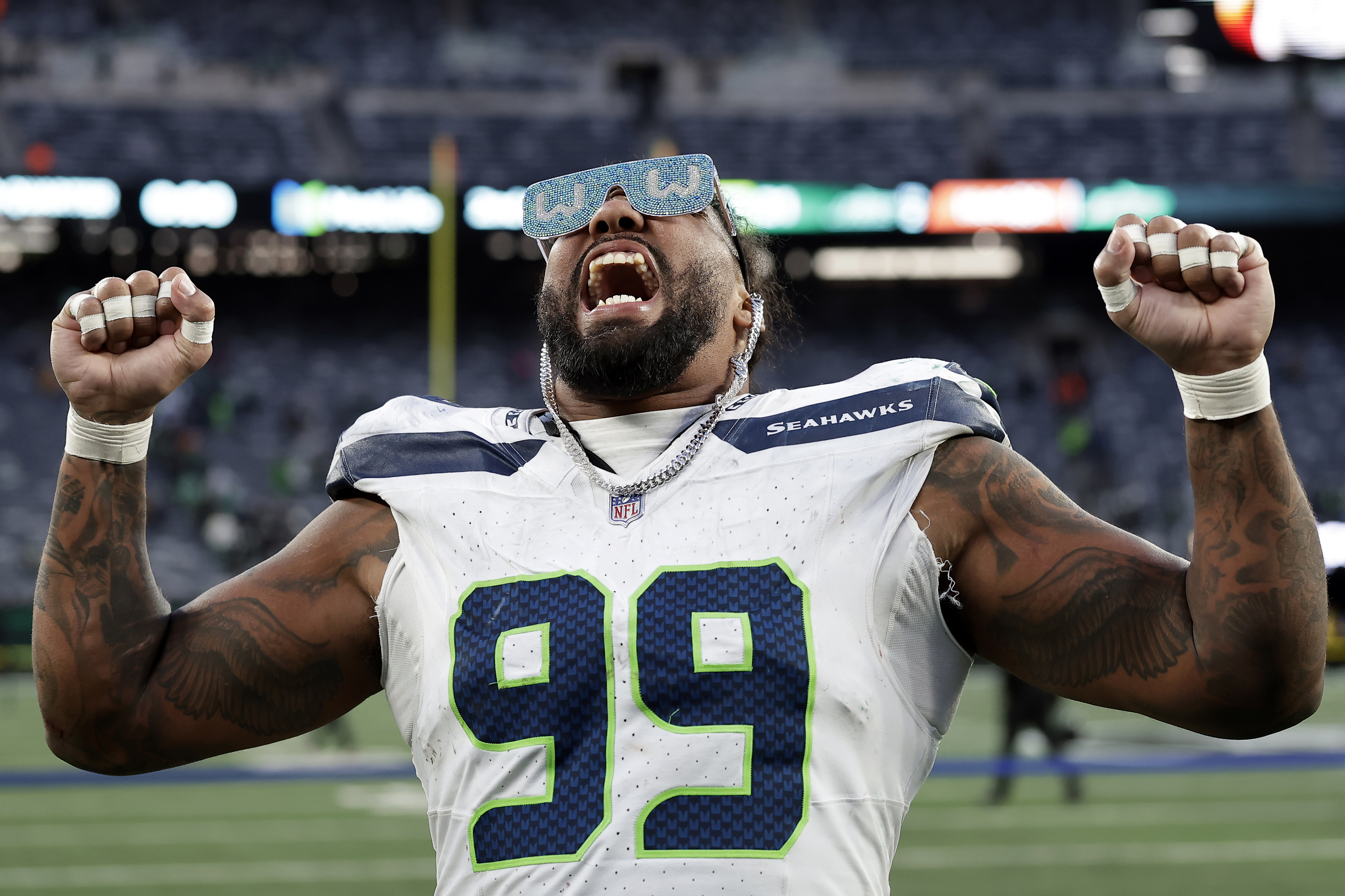 Seattle Seahawks defensive end Leonard Williams (99) reacts walking off the field after an NFL football game against the New York Jets Sunday, Dec. 1, 2024, in East Rutherford, N.J.