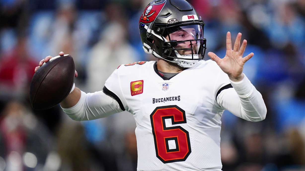 Tampa Bay Buccaneers quarterback Baker Mayfield passes against the Carolina Panthers during the first half of an NFL football game, Sunday, Dec. 1, 2024, in Charlotte, N.C.