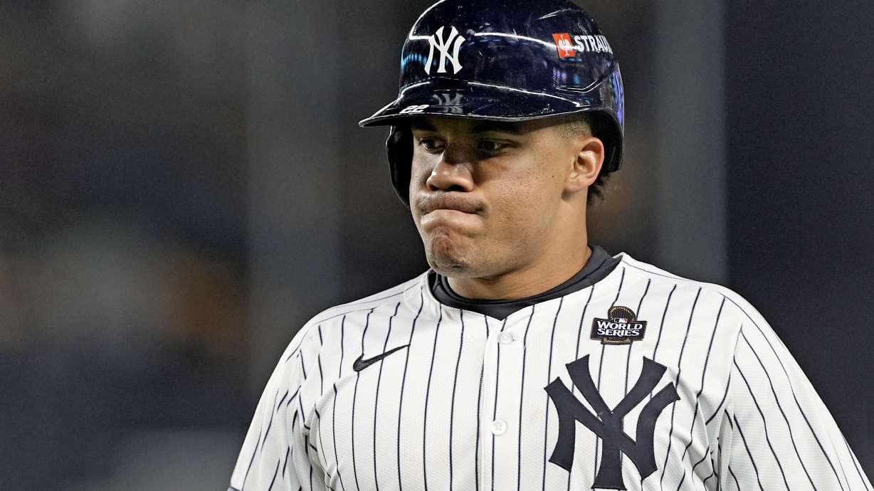 New York Yankees' Juan Soto reacts after flying out against the Los Angeles Dodgers during the eighth inning in Game 3 of the baseball World Series, Monday, Oct. 28, 2024, in New York.