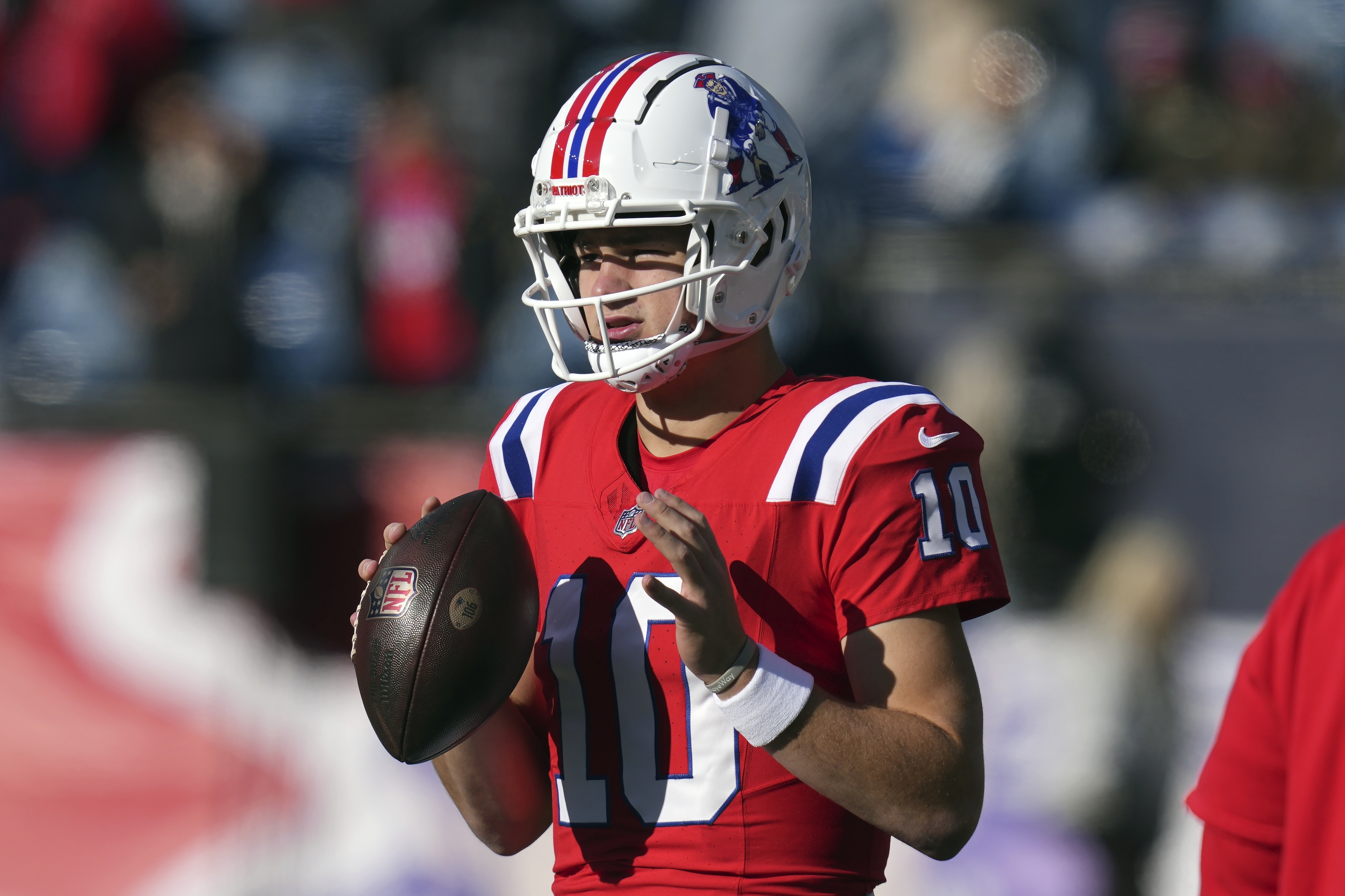 New England Patriots quarterback Drake Maye warms up before an NFL football game against the Indianapolis Colts, Sunday, Dec. 1, 2024, in Foxborough, Mass.