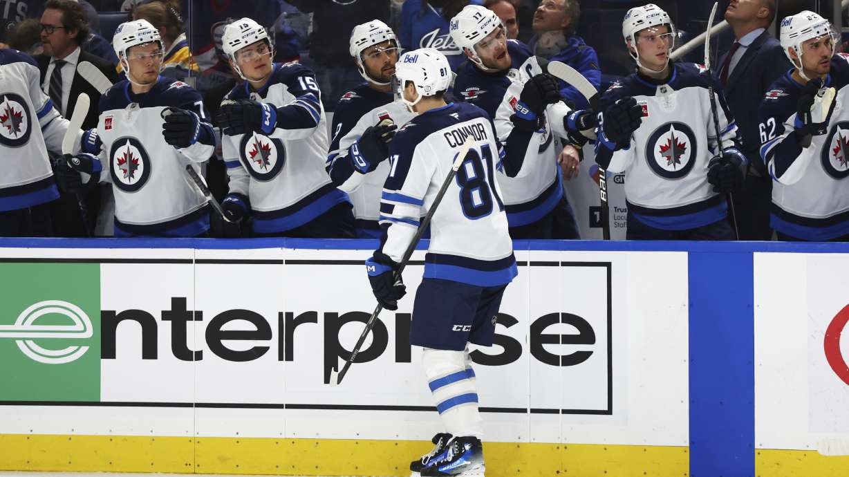Winnipeg Jets left wing Kyle Connor (81) celebrates after his goal during the second period of an NHL hockey game against the Buffalo Sabres, Thursday, Dec. 5, 2024, in Buffalo, N.Y.