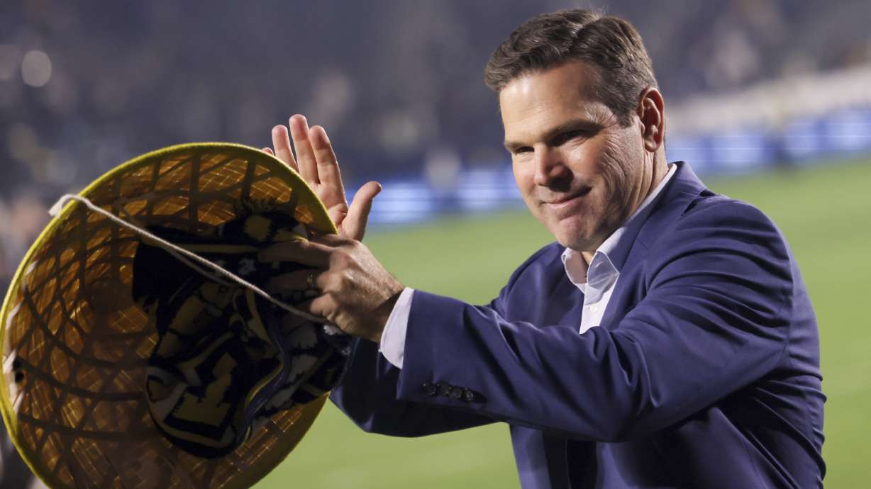 Los Angeles Galaxy head coach Greg Vanney celebrates after a win over the Seattle Sounders in an MLS Western Conference final soccer match, Saturday, Nov. 30, 2024, in Carson, Calif.