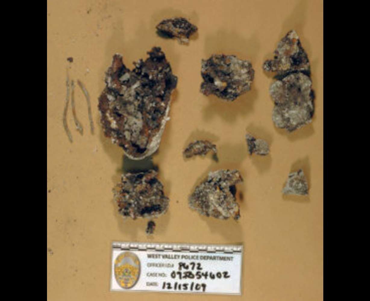 A chunk of charred metal taken as evidence in the case of missing Utah woman Susan Powell on Dec. 9, 2009.