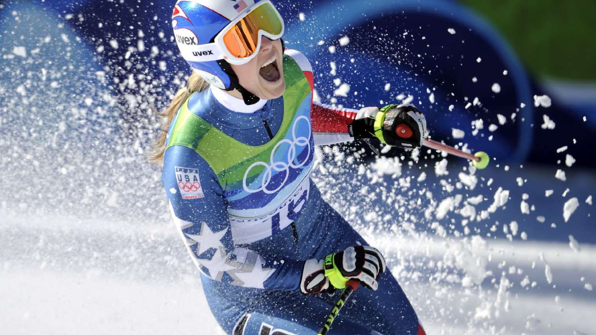 FILE - Lindsey Vonn of the United States, reacts in the finish area after completing the Women's downhill at the Vancouver 2010 Olympics in Whistler, British Columbia, Feb. 17, 2010.