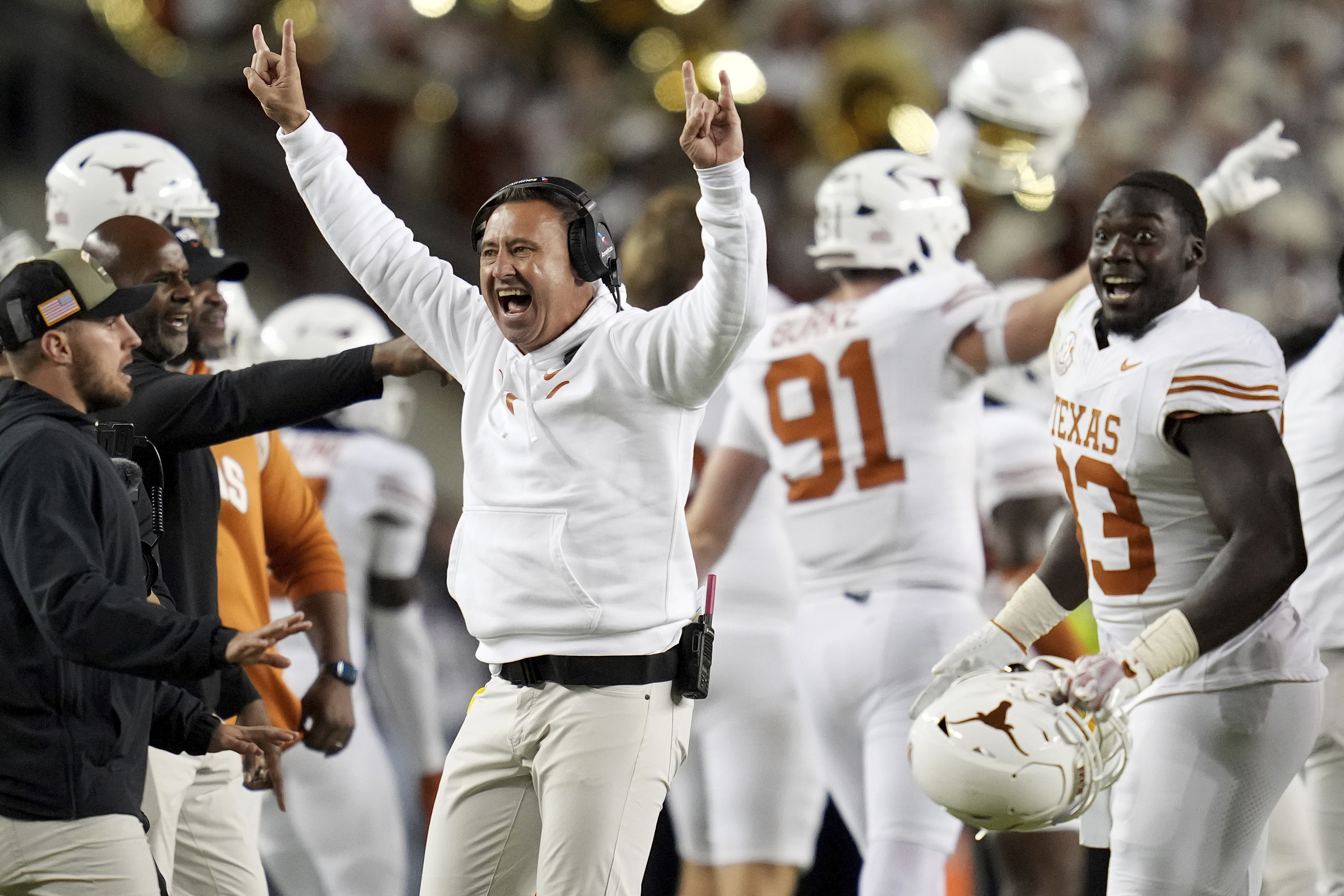 Texas head coach Steve Sarkisian, center left, reacts as his team recovers a fumble late in the fourth quarter of an NCAA college football game against Texas A&M, Saturday, Nov. 30, 2024, in College Station, Texas.