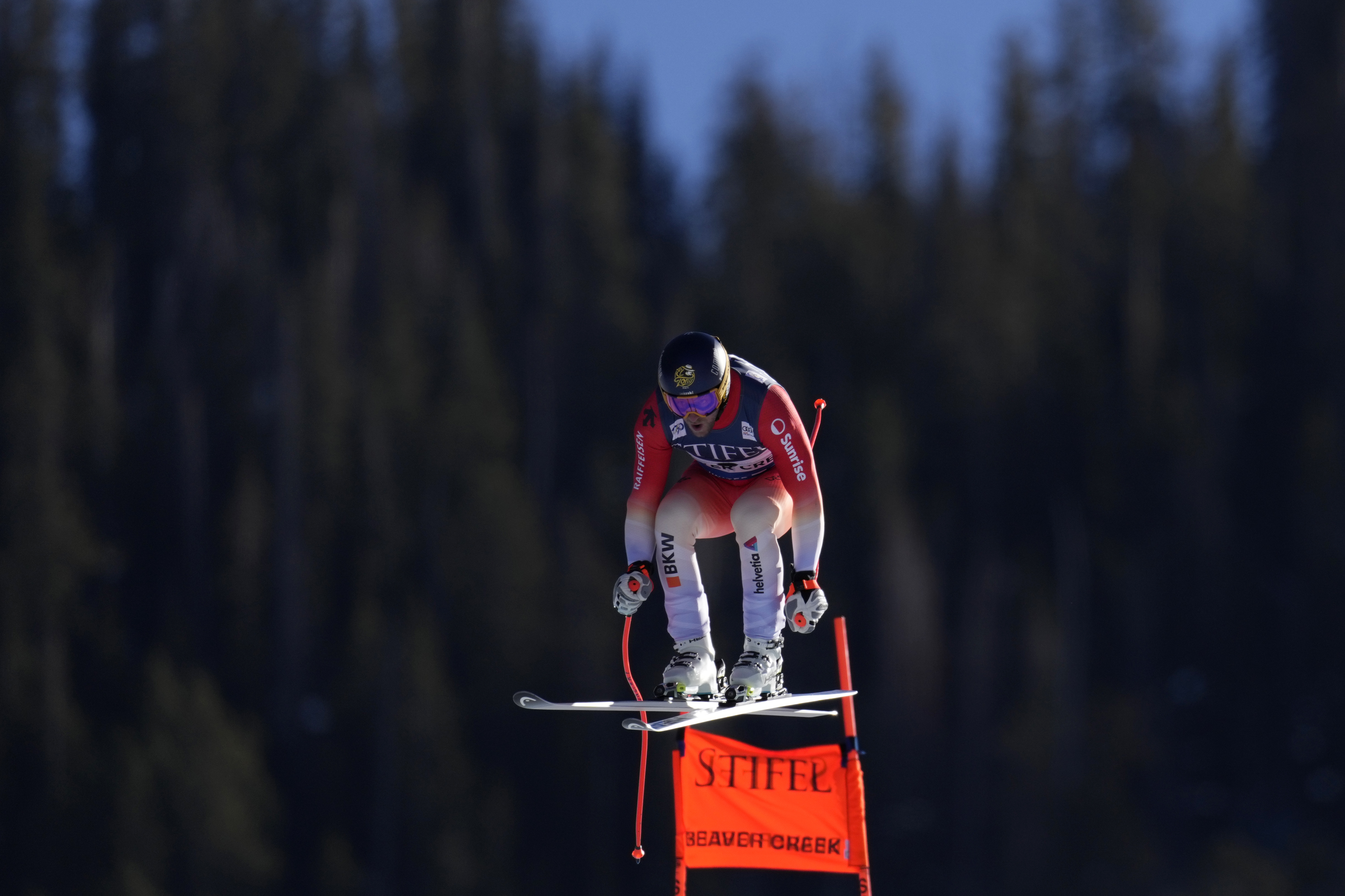Switzerland's Justin Murisier competes during a men's World Cup downhill skiing race, Friday, Dec. 6, 2024, in Beaver Creek.