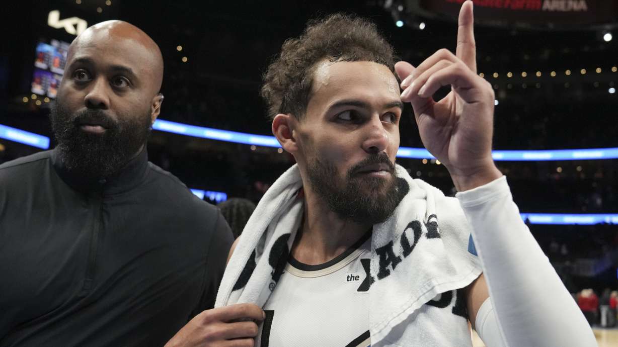 Atlanta Hawks guard Trae Young (11) walks off the court after an NBA basketball game against the Los Angeles Lakers, Friday, Dec. 6, 2024, in Atlanta.