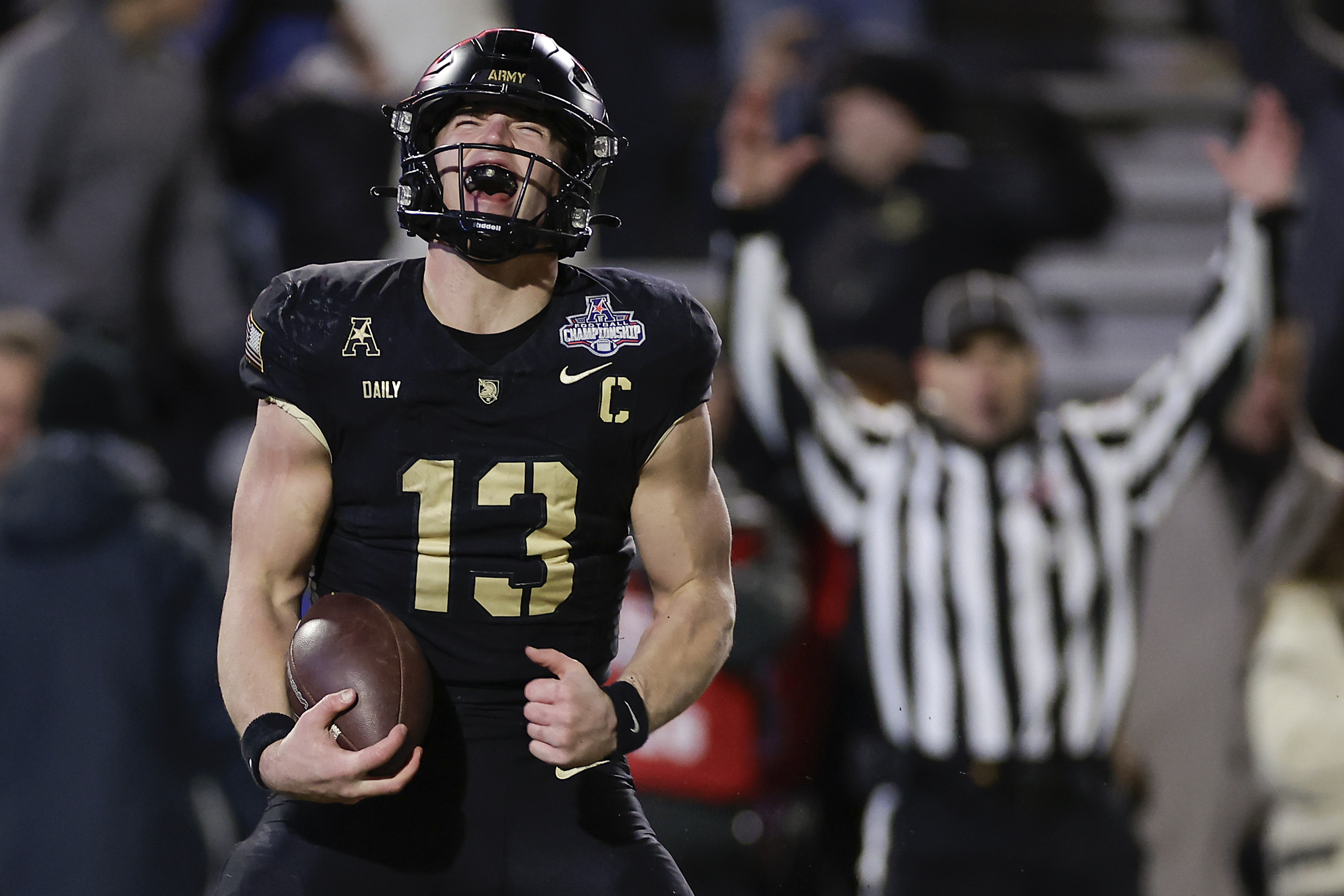 Army quarterback Bryson Daily (13) reacts after scoring a touchdown against Tulane during the first quarter of an NCAA college football game, Friday, Dec. 6, 2024, in West Point, N.Y.