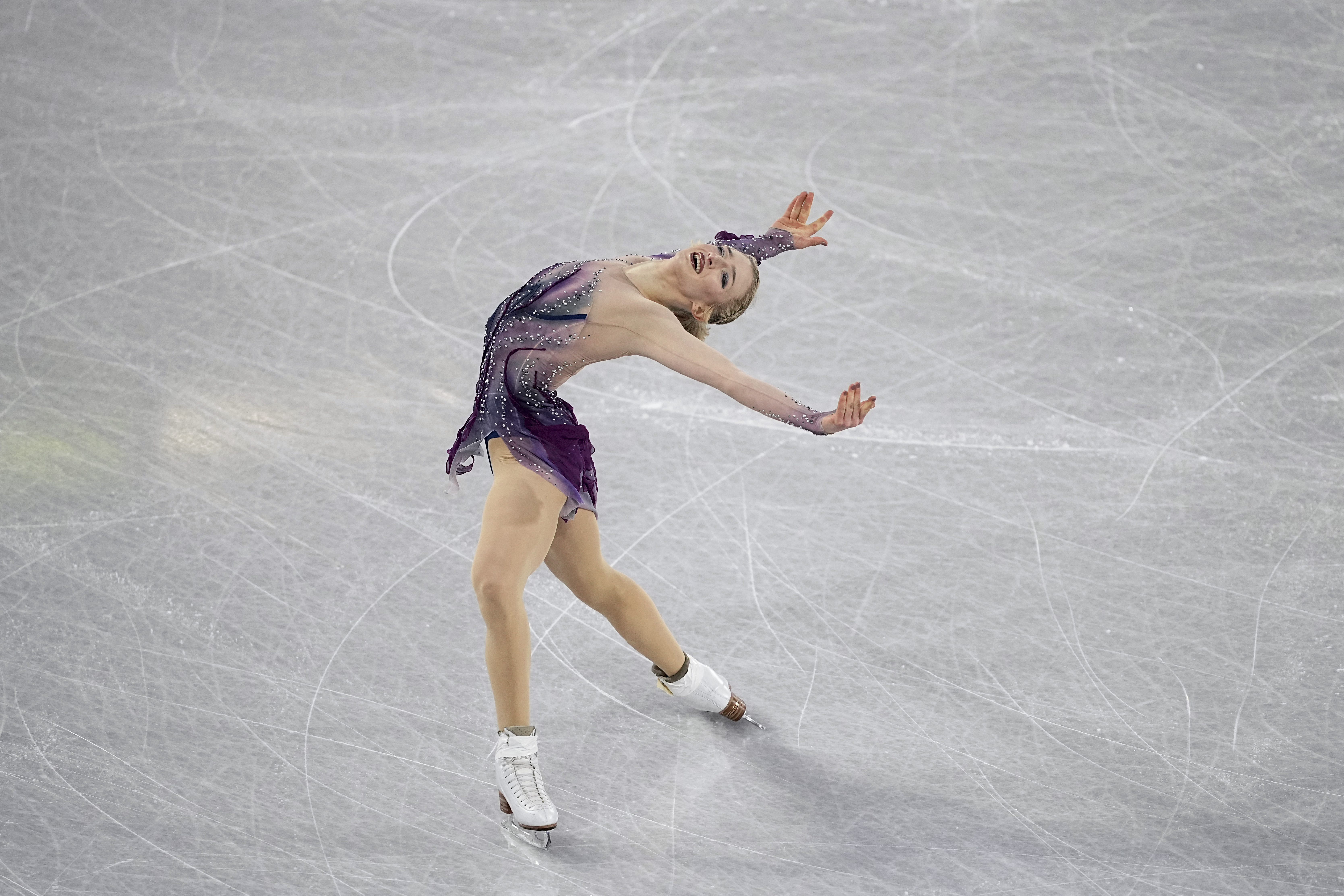 Amber Glenn, of the United States, competes in the women's free skating segment at the ISU Grand Prix Finals of Figure Skating, Saturday, Dec. 7, 2024, in Grenoble, France.