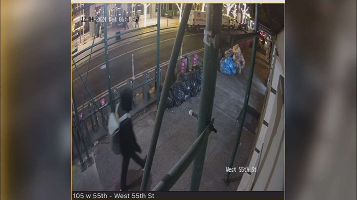 A video shows what appears to be the suspect in the UnitedHealthcare CEO’s shooting on West 55th Street before the killing. New York police investigators recovered a backpack believed to belong to the suspect Friday night.