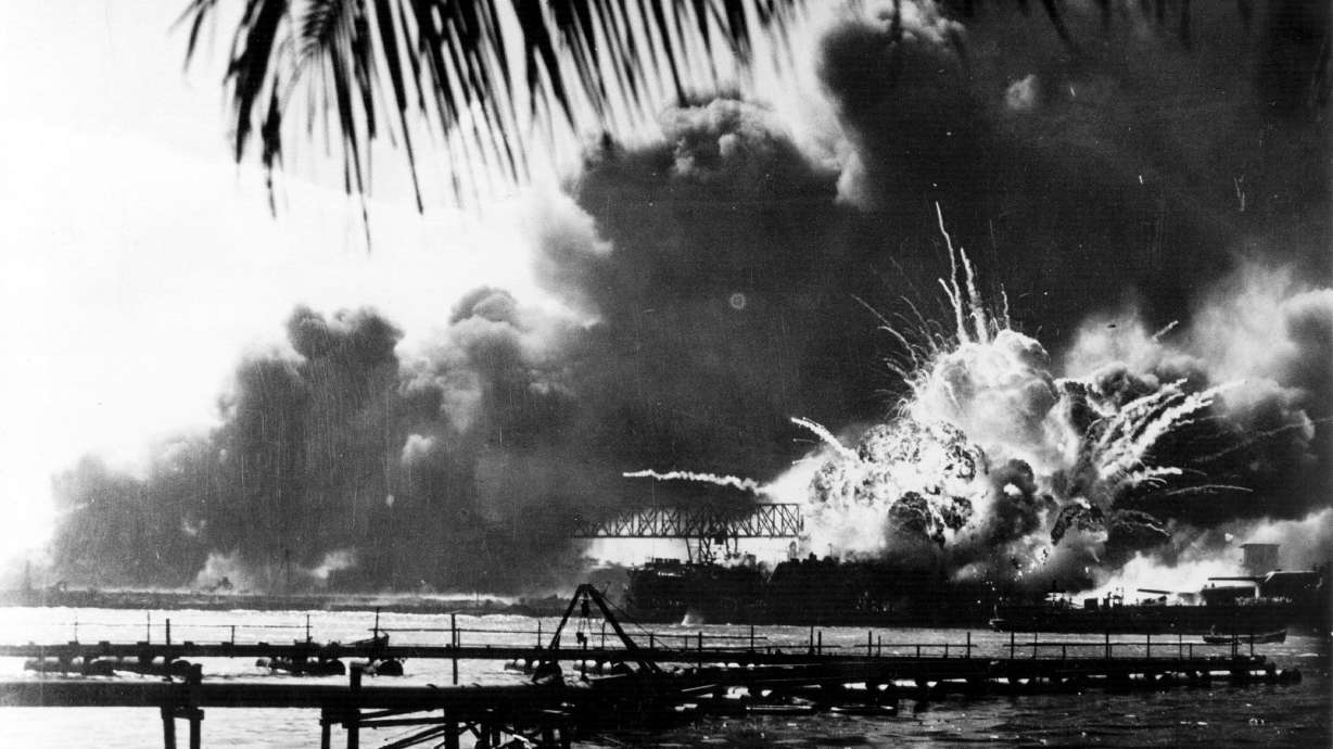 The American destroyer USS Shaw explodes during the Japanese attack on Pearl Harbor, home of the American Pacific Fleet during World War II, on Dec. 7, 1941.