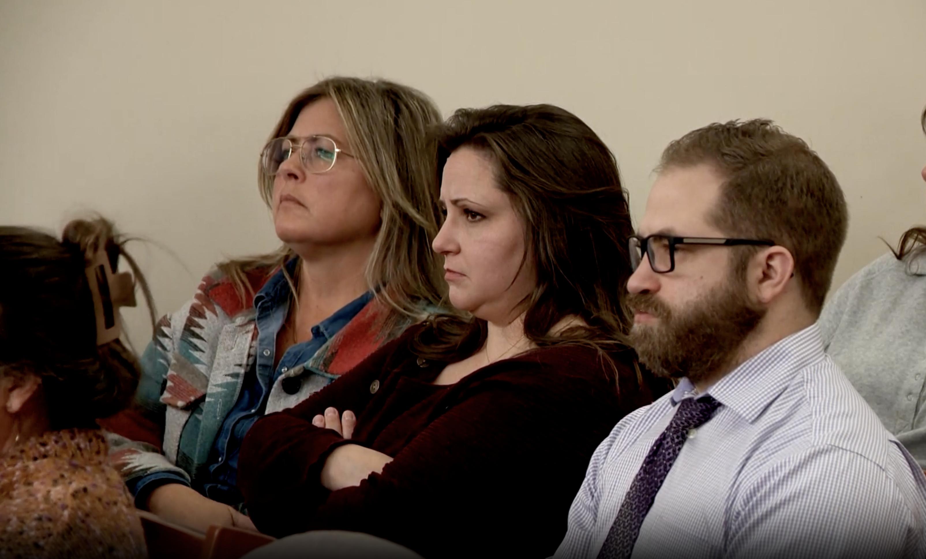 Susan Barnes, left, and her son, Cory Nemelka, right, listen to court proceedings Thursday in the sentencing of James Dekota Brunson, who was convicted of killing Family members of Linda Nemelka, Linda Namelka.