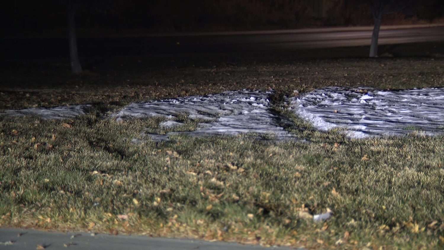 Tire track marks are pictured after a man was arrested for investigation of trying to hit teens with his vehicle.