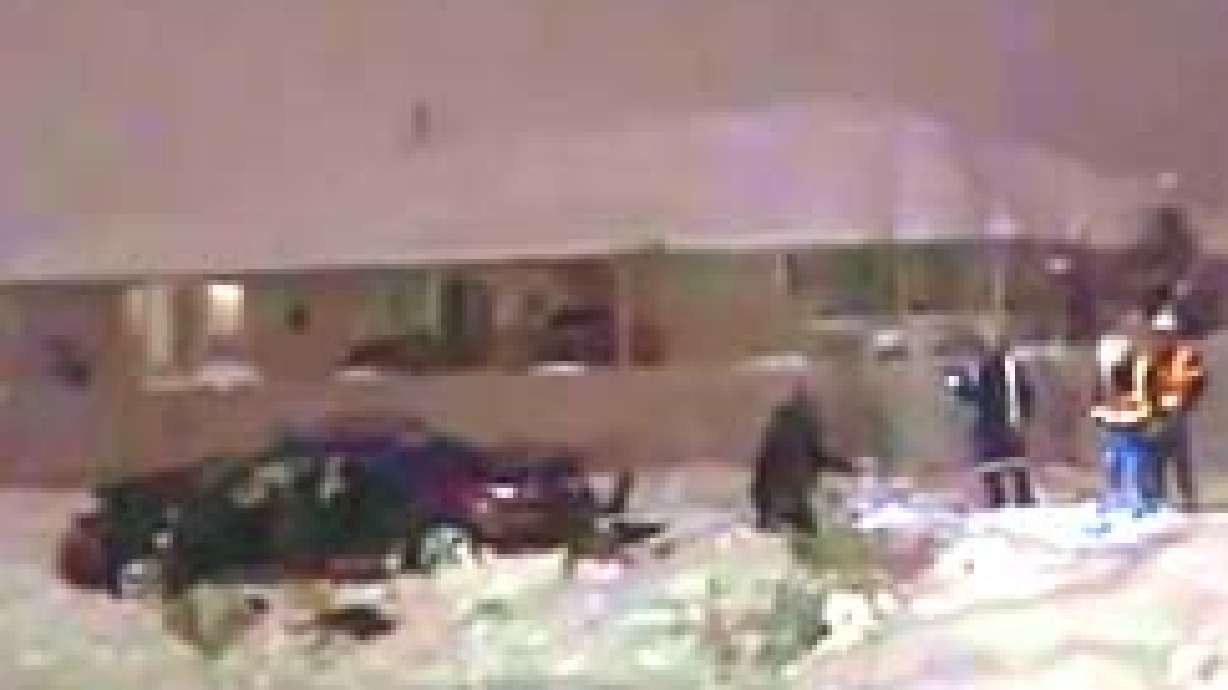 Train hits car, 3 people injured