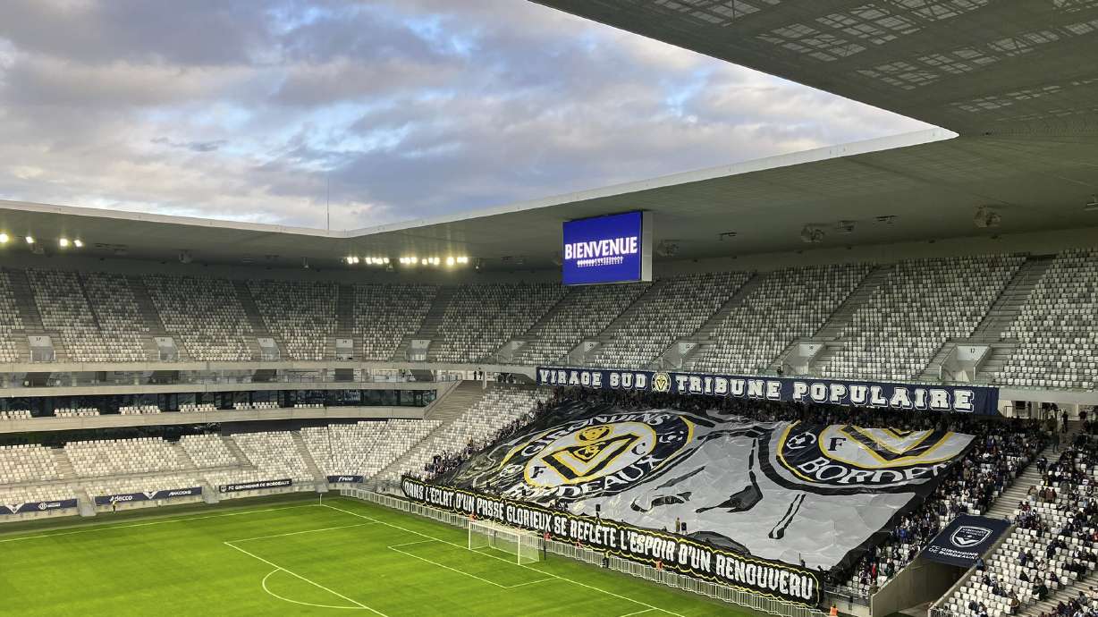 FILE - Bordeaux supporters unfurl a large banner on Oct. 12, 2024 before the French Championnat National 2 soccer match between Bordeaux and Avranches.