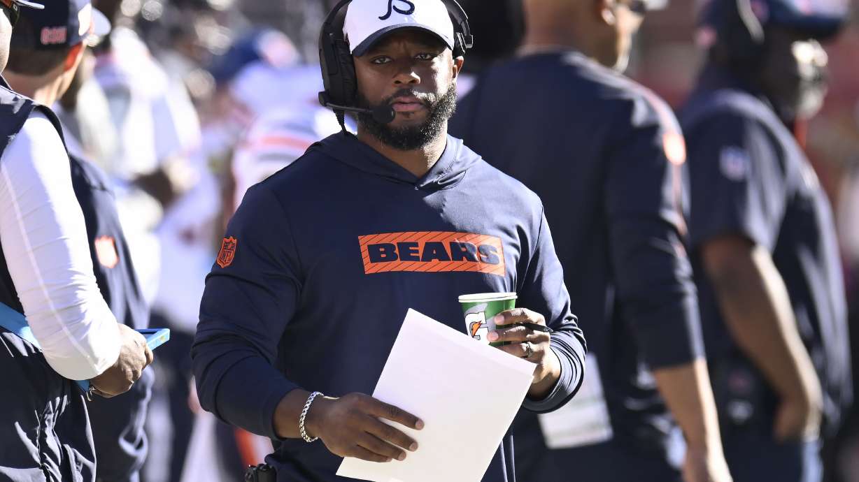 Chicago Bears interim head coach Thomas Brown watches from the sideline during the first half of an NFL football game against the San Francisco 49ers in Santa Clara, Calif., Sunday, Dec. 8, 2024.
