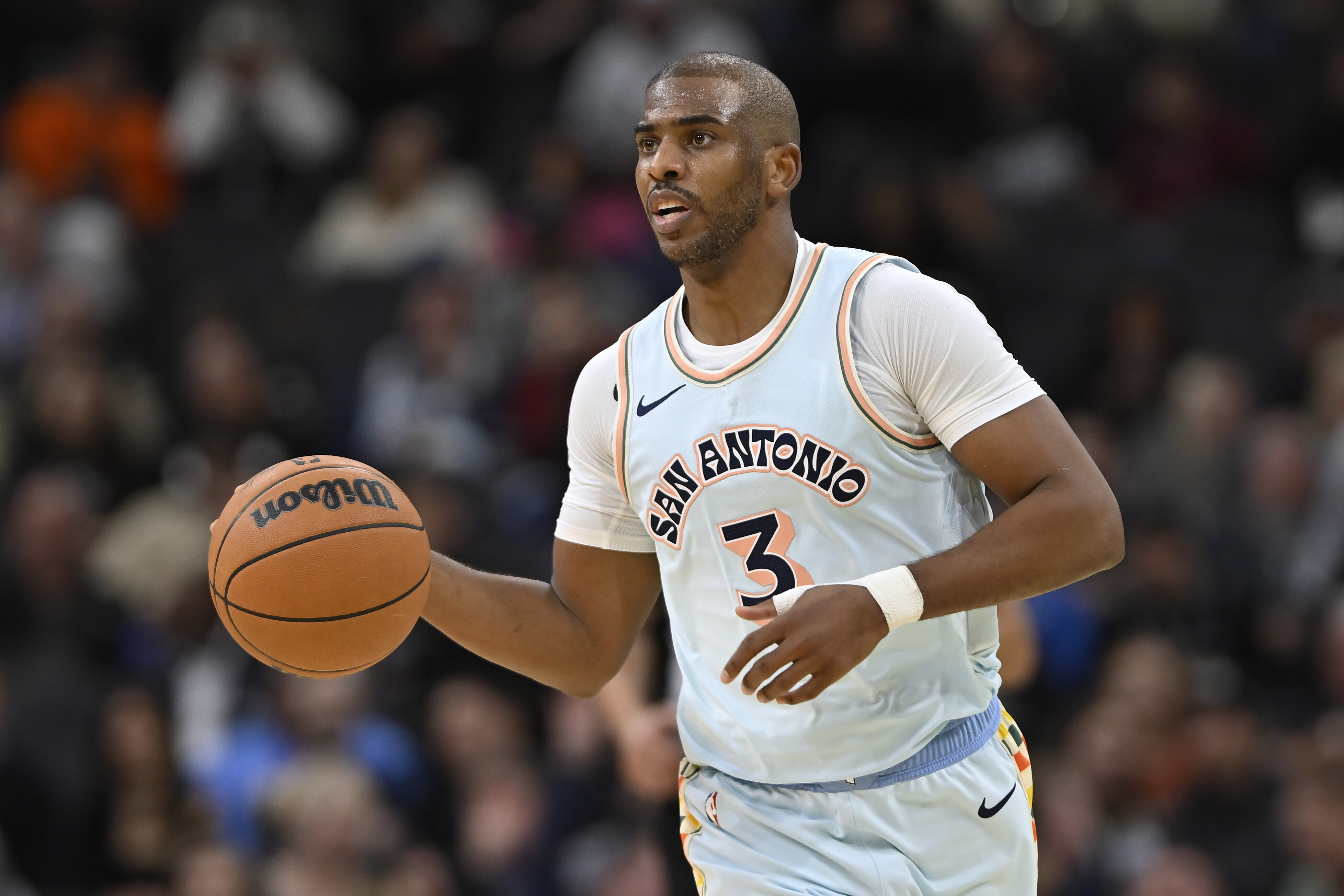 San Antonio Spurs' Chris Paul runs upcourt during the first half of an NBA basketball game against the New Orleans Pelicans, Sunday, Dec. 8, 2024, in San Antonio.