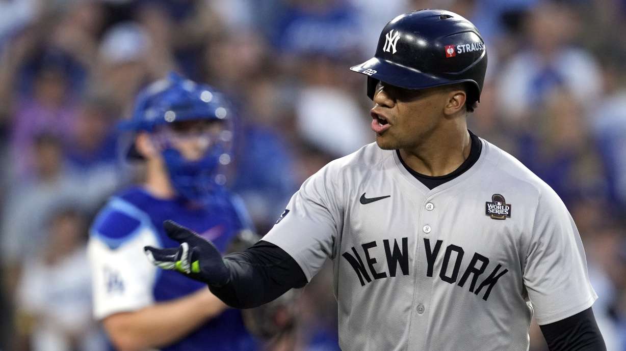 FILE - New York Yankees' Juan Soto celebrates after hitting a home run against the Los Angeles Dodgers during the third inning in Game 2 of the baseball World Series, Saturday, Oct. 26, 2024, in Los Angeles.