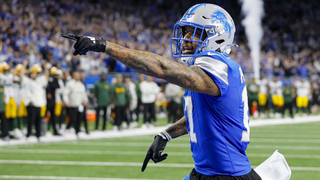 Detroit Lions wide receiver Tim Patrick (17) celebrates after a touchdown against the Green Bay Packers during the second half of an NFL football game in Detroit, Thursday, Dec. 5, 2024.