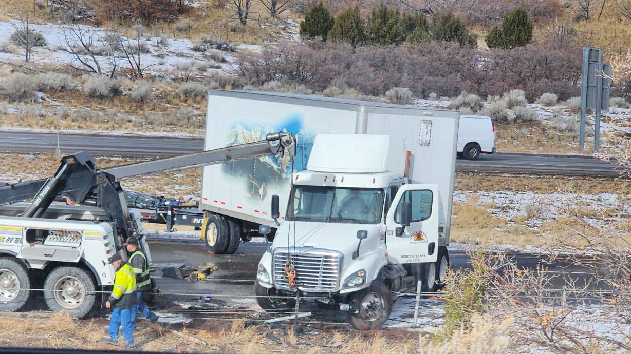 Crews clean up following a fatal five-vehicle crash on I-15 near Scipio, Dec. 9.