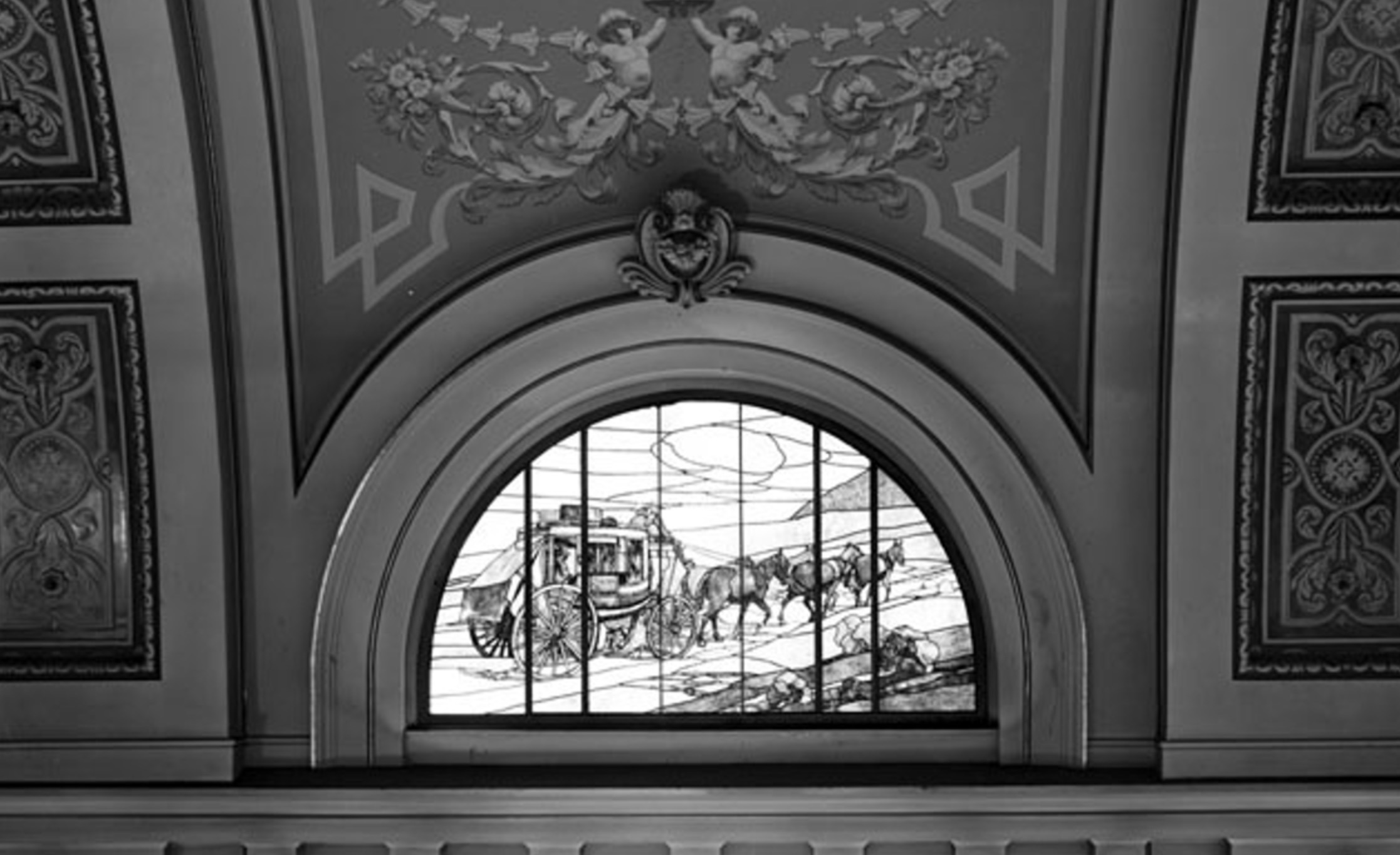 A stained glass window depicting horses and a carriage is pictured inside the Union Pacific Railroad Station on Jan. 15, 1910.