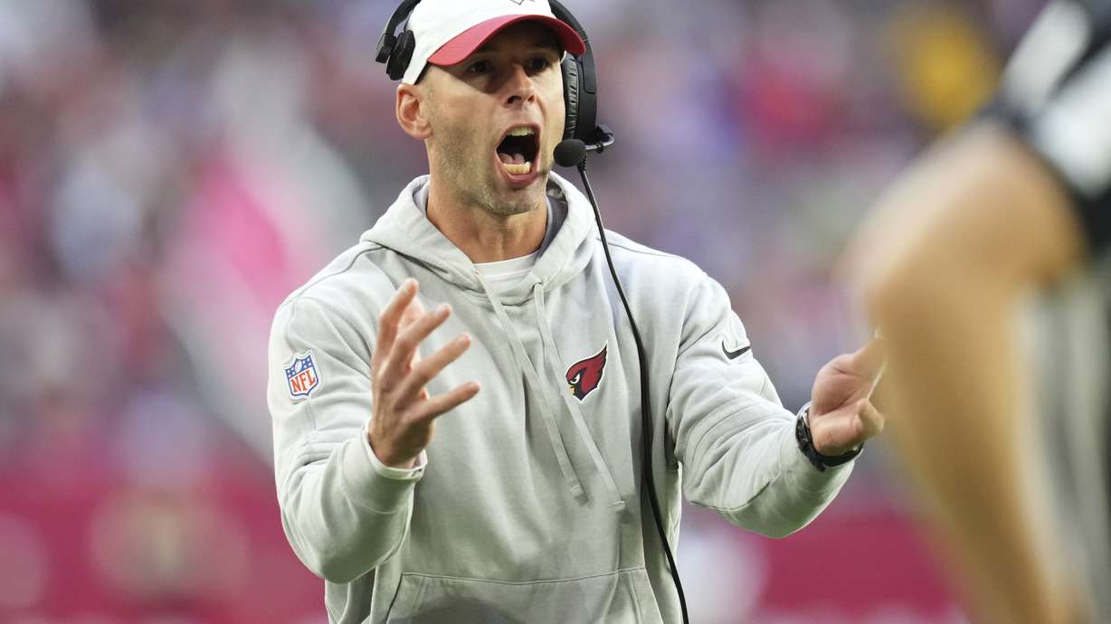 Arizona Cardinals head coach Jonathan Gannon looks for a call during the second half of an NFL football game against the Seattle Seahawks, Sunday, Dec. 8, 2024, in Glendale, Ariz.